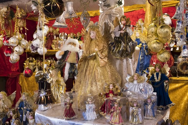 Various angel figurines at market stall