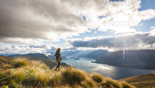 Female hiker looking at lake