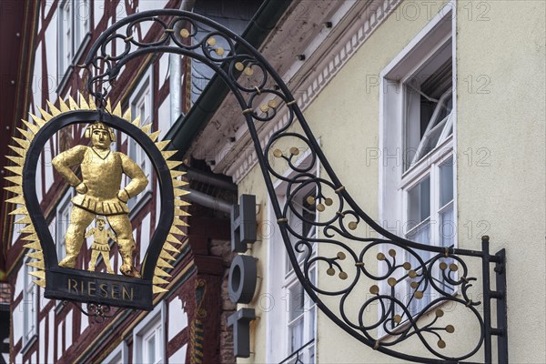 Hanging shop sign of the Gasthof Zum Riesen