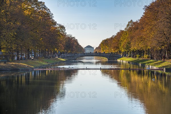 East side of Nymphenburg Palace in autumn with lock channel