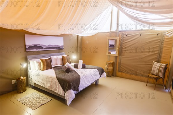 Double bed in luxury tent