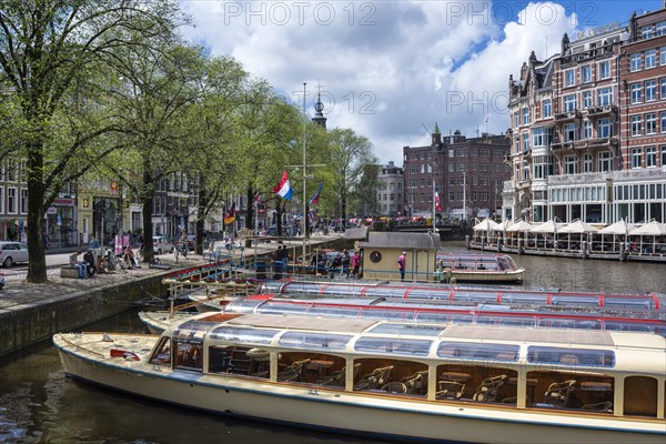 Canal boats on the Amstel river