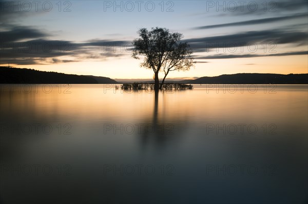 Evening atmosphere with sunset with clouds at Lake Constance