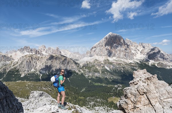 Woman on via ferrata to Nuvolau and Averau