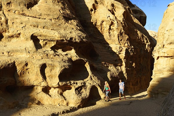 Couple hiking Little Petra