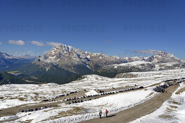 View from the Auronzo hut 2320 m over the toll road below the Three Peaks of Lavaredo to Lake Misurina and the Cristallino di Misurina 2775 m