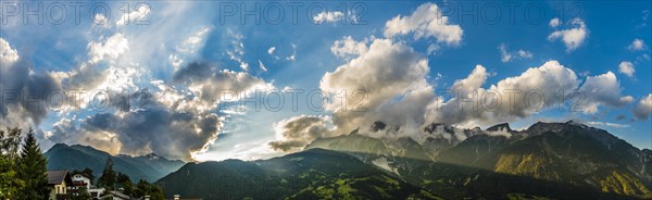 Alpine panoramay with cloud sky