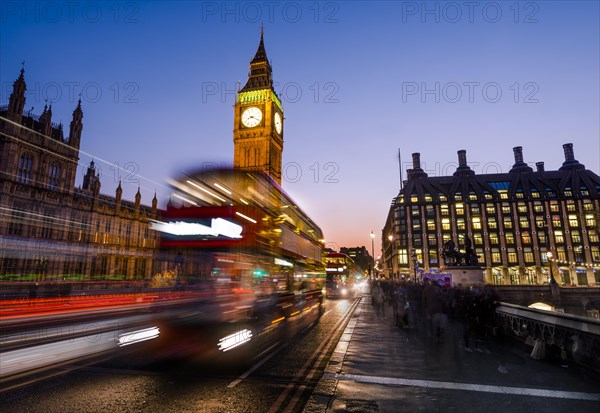 Red double decker bus in front of Big Ben