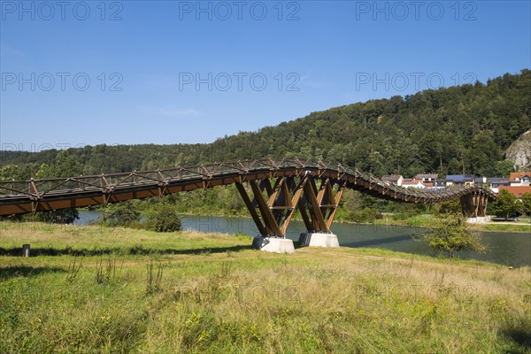 Stressed ribbon bridge