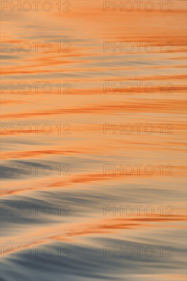 Wave pattern on the Brahmaputra river at sunset