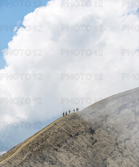 People walking on crater rim