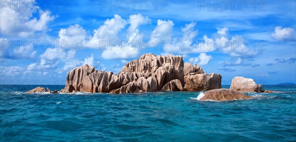 Granite rocks in front of the island of St. Pierre
