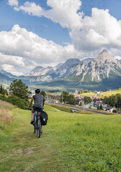 Cyclist on bike tour with mountain bike