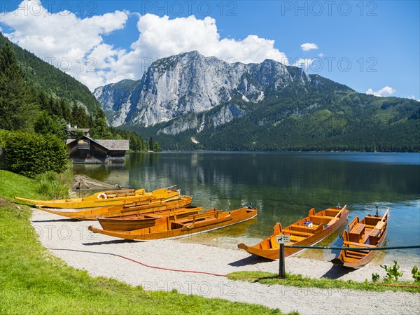 View of beach and boats behind the Trisselwand