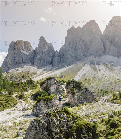 Hiker standing on rocks