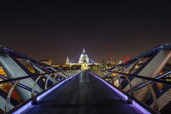 Illuminated Millennium Bridge and St. Paul's Cathedral