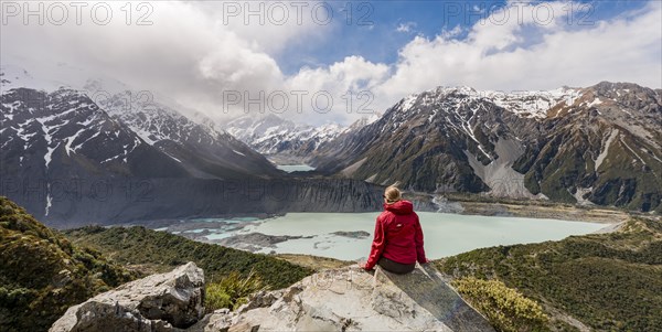 Hiker sitting on rocks