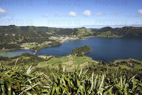 View from Miradouro do Cerrado das Freiras into the volcanic crater Caldera Sete Cidades with the crater lakes Lagoa Verde and Lago Azul