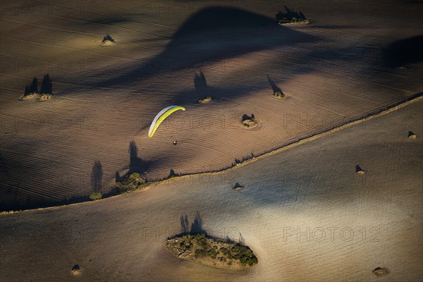 Paragliding over fields