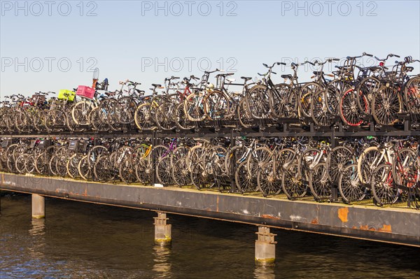 Bicycle parking lot on the river Het IJ