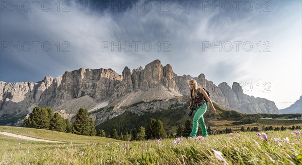 Hiker in front of Sella Group with Piscadu