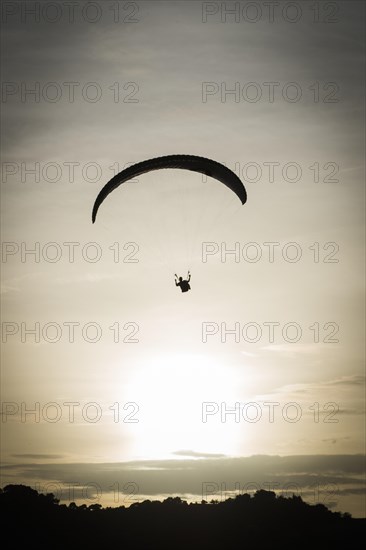 Paragliding at sunset