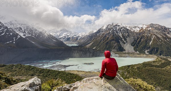 Hiker sitting on rocks