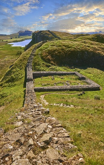 Hadrian's Wall with foundation walls of former watchtower
