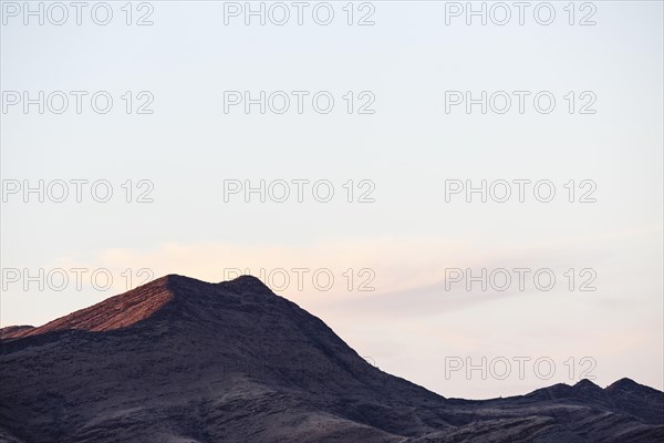 Hilly landscape in evening light