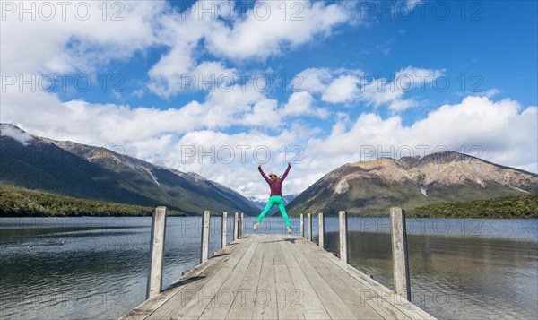 Woman jumping in the air