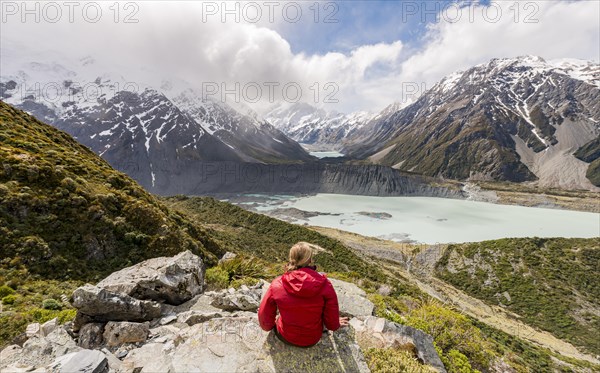Hiker sitting on rocks