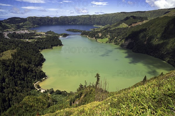 View of the volcanic crater Caldera Sete Cidades with the crater lakes Lagoa Verde and Lago Azul