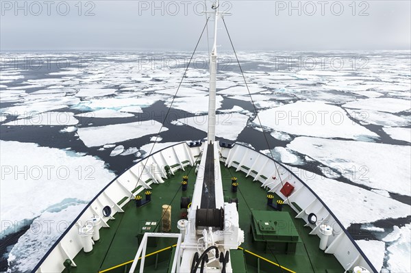 Expedition Boat navigating through melting pack ice
