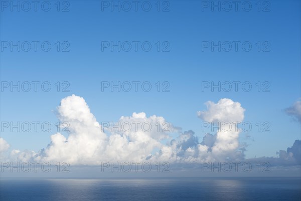 Cumulonimbus clouds above sea