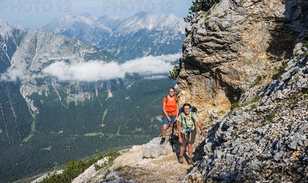 Two female hikers on trail