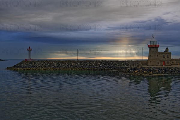 Lighthouse in the harbour of Howth