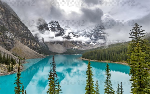 Clouds hanging between the mountain peaks