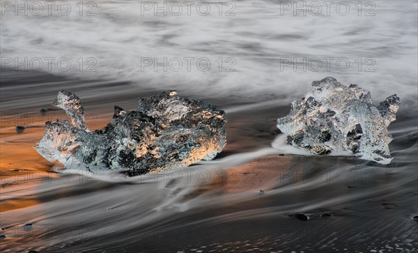 Ice, chunks of ice on lava beach near Jokulsarlon