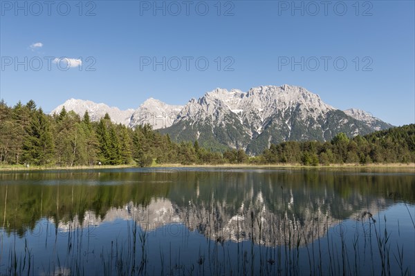 Western Karwendelspitze is reflected in the Luttensee