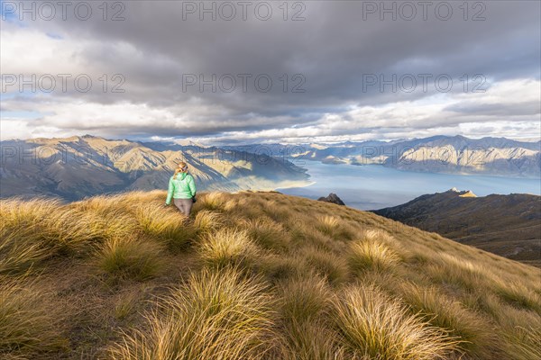 Hiking woman looking at lake