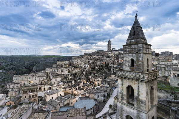 Church tower of San Pietro Barisano in front of the old town with cathedral