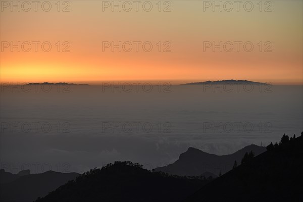 View from Samara Volcano across Teno massif towards La Palma in trade clouds