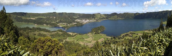 Panoramic view of the volcanic crater Caldeira das Sete Cidades and the volcanic lakes Lagoa Azul and Lagoa Verde