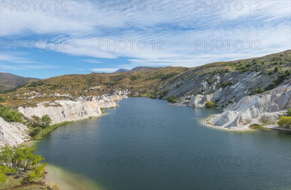 Lake surrounded by limestone cliffs