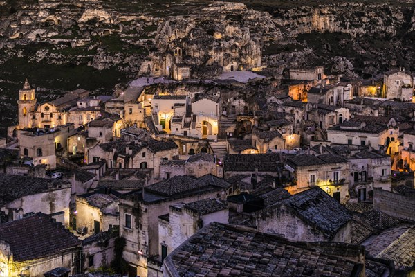 Sasso Caveoso district with San Pietro Caveoso church and Santa Maria de Idris cave church at night