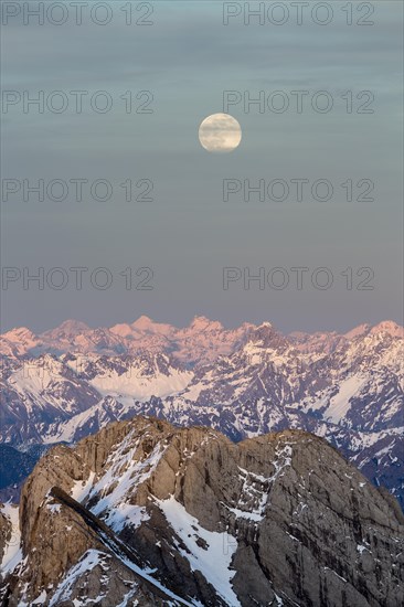 Santis Mountain overlooking Alpstein massif at full moon