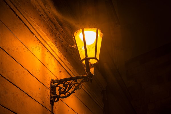 Old street lamp lit