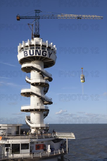 Bungee jump tower on the pier