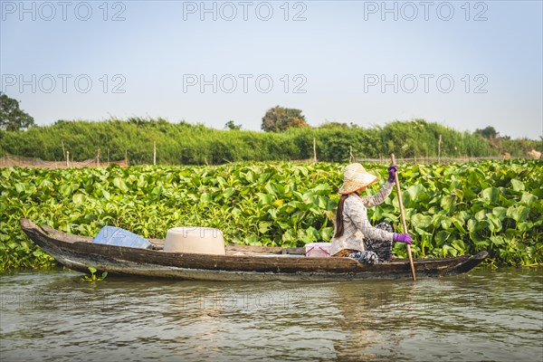 Local trader in rowing boat