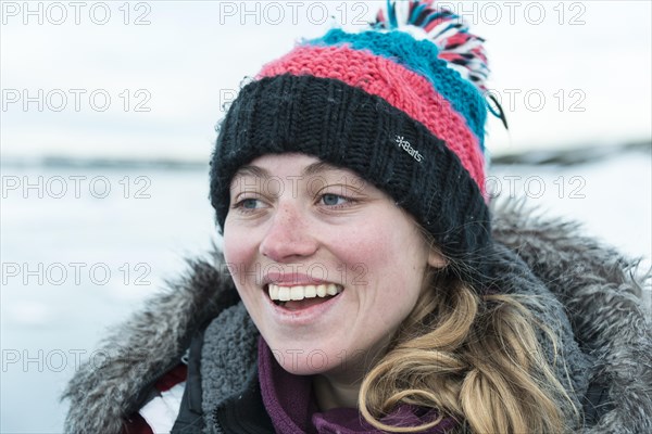 Young woman wearing woolly hat